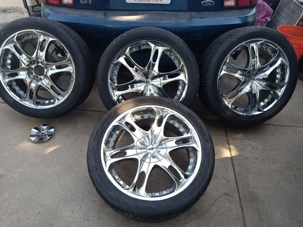 SALE. Chrome rims with tires 18"